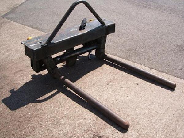 Round bale handler